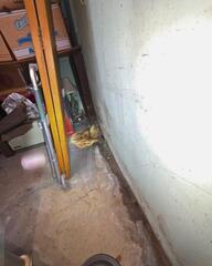 The clues were pretty big for anyone to miss in Tom's basement! Stains running across the basement walls and damp floors showed serious water intrusion issues down here.