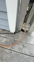 Detailed inspection of composite decking clearance and vertical support trim posts