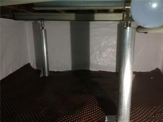 Quality 1st Basement Systems laid drainage matting down in this damp crawl space to keep out moisture.