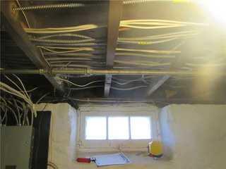 This crawl space in the Bronx, NY was always cold. The floor above it was freezing and the homeowner had high heating bills.