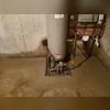 Here, you can see the production of installing a WaterGuard system. The WaterGuard system is installed along the perimeter of the basement wall underground, which then channels the water to the TripleSafe sump pump.