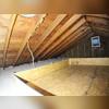 Plywood dams are built to hold back the 17" of TrueSoft Cellulose Insulation.