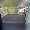 This homeowner received the perfect porch to sit and have a morning cup of coffee.