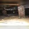 This photo shows the crawlspace when our System Design Specialist first visited the home. While it doesn't look to be in too rough of shape, this crawlspace had very high relative humidity levels. This issue may have tried to be fixed before with another liner, but it obviously did not do what it...