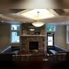 In the sitting room the stone fireplace and the lights surrounding make this the ideal place to just sit and relax after a long day.