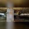 Piers like this can sink into the soft soils in dirt floor crawl spaces over time.
