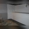 The CleanSpace&trade; vapor barrier is installed on the walls and the WaterGuard&trade; drainage system is under the floor.