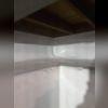 We covered the walls in our CleanSpace liner, this is a thick durable liner that is often used in crawl spaces. It is antimicrobial and sends the water down into the WaterGuard system.