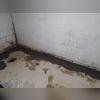 WaterGuard is our patented waterproofing system, lining the walls of the basement.