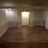 This is what the final transformation looked like. After the concrete cured and the homeowner got new flooring installed, we then installed our EverLast panels to replace the cut out drywall. Our EverLast Wall panels can be washed with water and soap if they ever get dirty, and they will never be...