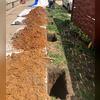Our Foreman, Juan Pena, and his production team dug seven holes outside of the home to begin the process. They laid tarps down to make sure dirt and soil didn't get everywhere.