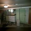 This basement was wet, showing signs of water damage and mold.