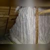 We removed the existing fiberglass from this knee wall and installed open cell spray foam to it. 