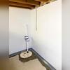 BrightWall Basement Wall Panels, WaterGuard floor drainage system, and TripleSafe Sump Pump