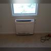 Here is the indoor ductless heat pump, tucked neatly under one of the upstairs windows.