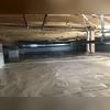 A heavy-duty 20-mil CleanSpace liner was used to cover the flooring of this crawl space. This vapor barrier helps to prevent moisture from rising into the crawl space and increasing the relative humidity. It gets wrapped around all piers and mechanically fastened to the foundation walls six to...