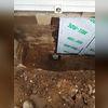 This portion of the home was allowing water to seep through into the basement. Because our team excavated all the way to the footing of this home, they were able to access the entire exterior foundation wall. They sealed the foundation wall and applied a waterproofing membrane that will aid in...