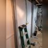 Since stabilizing the foundation walls was only half of the problem, we installed our waterproofing system to flush intruding water out before it has time to fester inside the block walls.