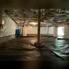 The crew has put down the drainage mat that goes under the CleanSpace vapor barrier, and has begun putting CleanSpace on the walls.