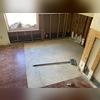 Removed moldy drywall and flooring.