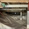 In total, 30 of these SmartJack vertical beams were installed in the crawl space to stabilize the sinking floors.