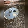 This sump pump helps pump any water that comes in the crawl space out. he crew fills in around this sump pump with crushed stone.