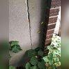 A long vertical crack has been formed on one of the walls on the side of the house. This crack is disturbing, because it was a sign that the front wall of the house was quietly peeling away.