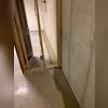 WaterGuard floor drainage system installed around the perimeter of the basement to collect water passing through the walls and redirect it to a sump pump