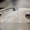 To prepare for the injection of PolyLevel. We have to strategically drill dimed-sized holes into the concrete. Once through, we can do the main part of the installation.