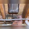 Batt insulation became wet from a copper pipe leakage.  Mold resulted from the leak on the joist and insulation.
