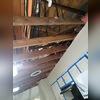 This shows where the Production Team removed mold-damaged ceiling in the kitchen.