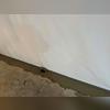 WaterGuard floor drainage system installed around the perimeter of the basement to collect water passing through the walls and redirect it to a TripleSafe sump pump