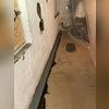 A trench was created around the perimeter of the basement and filled with some drainage rock before our WaterGuard XL system was placed within the trench. The WaterGuard will collect any water infiltrating through the walls and windows and transport it to the sump pump basin.