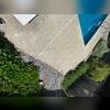 The crack in the pool deck was caused by settlement.