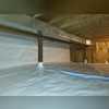 In order to improve the environment inside the crawlspace and prevent mold growth, we encapsulated both the original dirt base crawlspace as well as the gravel base addition crawlspace.