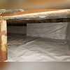 In order to improve the environment inside the crawlspace and prevent mold growth, we encapsulated both the original dirt base crawlspace as well as the gravel base addition crawlspace.