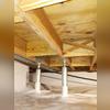 The floor joists in the crawl space had shrunk causing the floors above to sag.  We installed SmartJack support posts to stability to the floor joists and level out the floors above