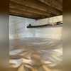 In order to combat the musty smells and high moisture levels, we sealed off all vents on interior of crawlspace with 2 inch foam.  To neutralize any mold that was forming, we sprayed Mold-X on all floor joists and the subfloor.  We then installed a SuperSump basin with a  Zoeller M53.  After...