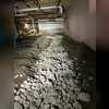 To help mitigate water in a dirt crawlspace and redirect to a discharge system, we dug trenches where we laid out filter cloth to minimize sediment getting into system, and installed four-inch slotted drain tile and connected the drain tile to discharge-system sump pit.  We backfilled with stone to...