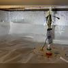 The TripleSafe sump pump system installed to keep the crawl space dry