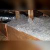 Our team creates a retaining wall and barrier to contain our blown-in TruSoft cellulose insulation.