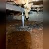 A photo highlighting the SmartJack Support System installed in the crawl space, providing essential reinforcement and stability to the home's foundation.