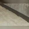 The WaterGuard Drainage System was installed around the perimeter of the basement and collects and channels water to the sump pump.