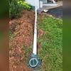 Buried downspouts with our patented LawnScape outlets were added to the sump pump and gutter discharge lines to prevent water from being dumped directly onto the foundation of the home.