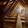 Silver Glo panel insulation was used to cover the attic walls and was sealed with Zyp Foam.