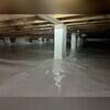 The piers are wrapped with Wallie to keep condensation out of the crawl space.