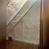 Spray foam was installed to fill in the gaps between framing and under side of the roof.