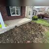 The cracks are sealed, and the soil is replaced. The soil needs time to naturally settle back the way it was, so expect a bit of a pile.