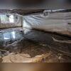 The previous encapsulation and pump system failed, allowing water and mud to get into the crawl space.