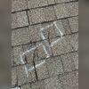 These cracked shingles can allow water to seep into the home.